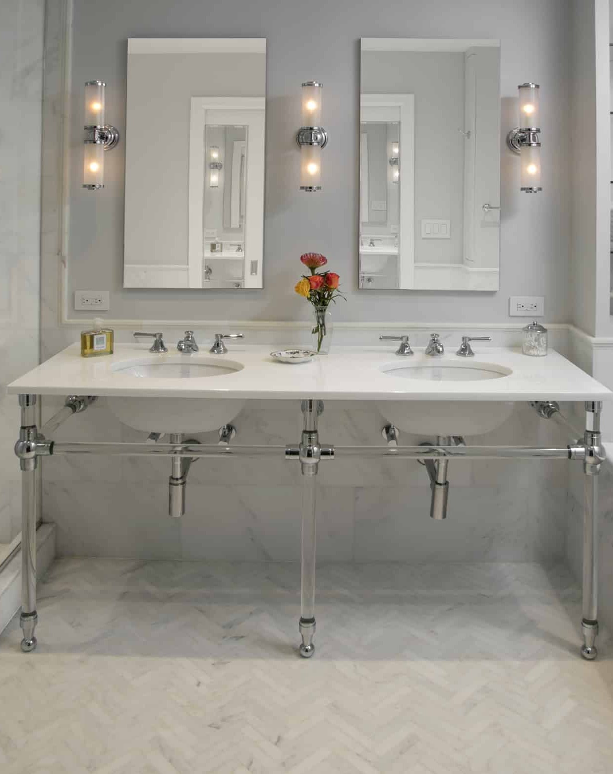 Herringbone marble floor bathroom NYC luxury renovation by Gurri Remodel