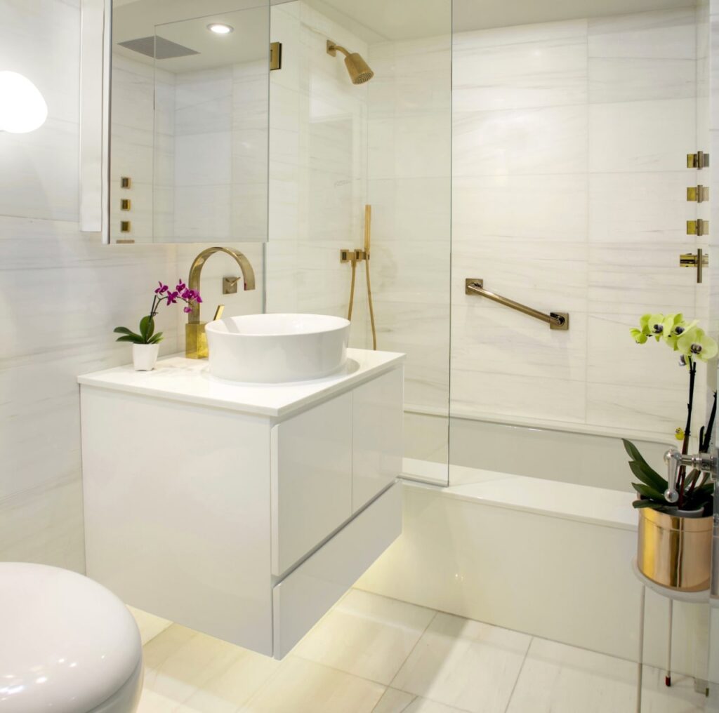 High-end bathroom remodeling in NYC with custom tile and modern fixtures by Gurri Remodel