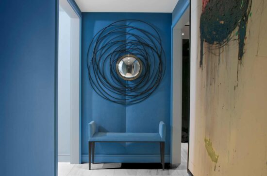 Upper West Side apartment entry foyer with onyx flooring and luxury interior renovation by Gurri Remodel