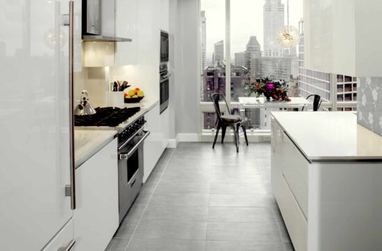 White kitchen remodeling Upper West Side NYC with modern minimalist design by Gurri Remodel